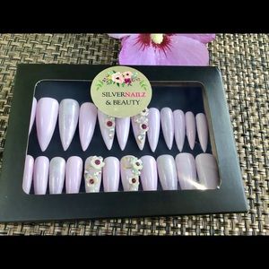 Soft pink gel floral stiletto Nails